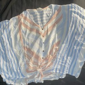 Women’s size large cropped blouse.